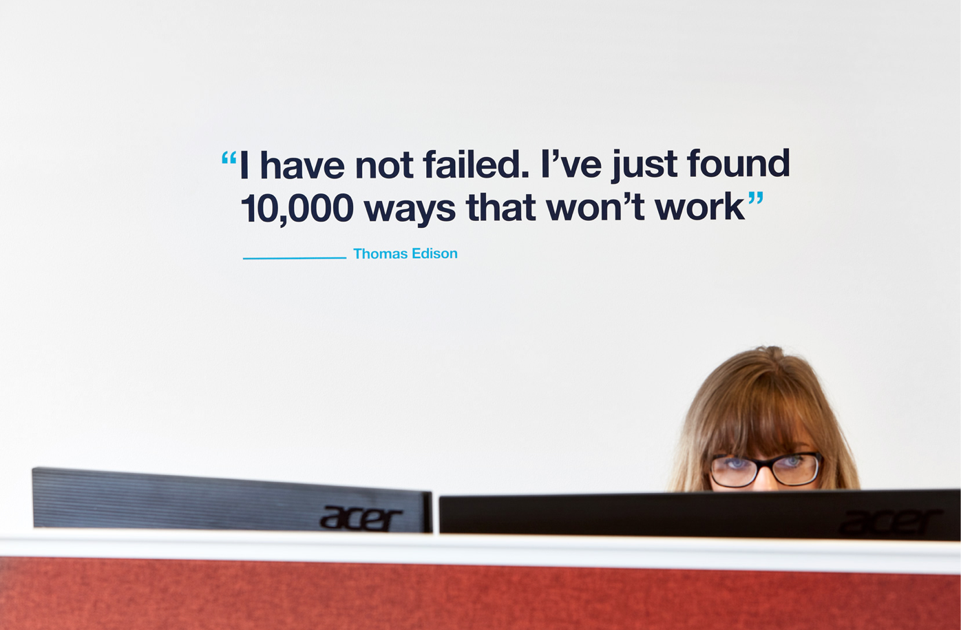 inspirational quote on wall in office