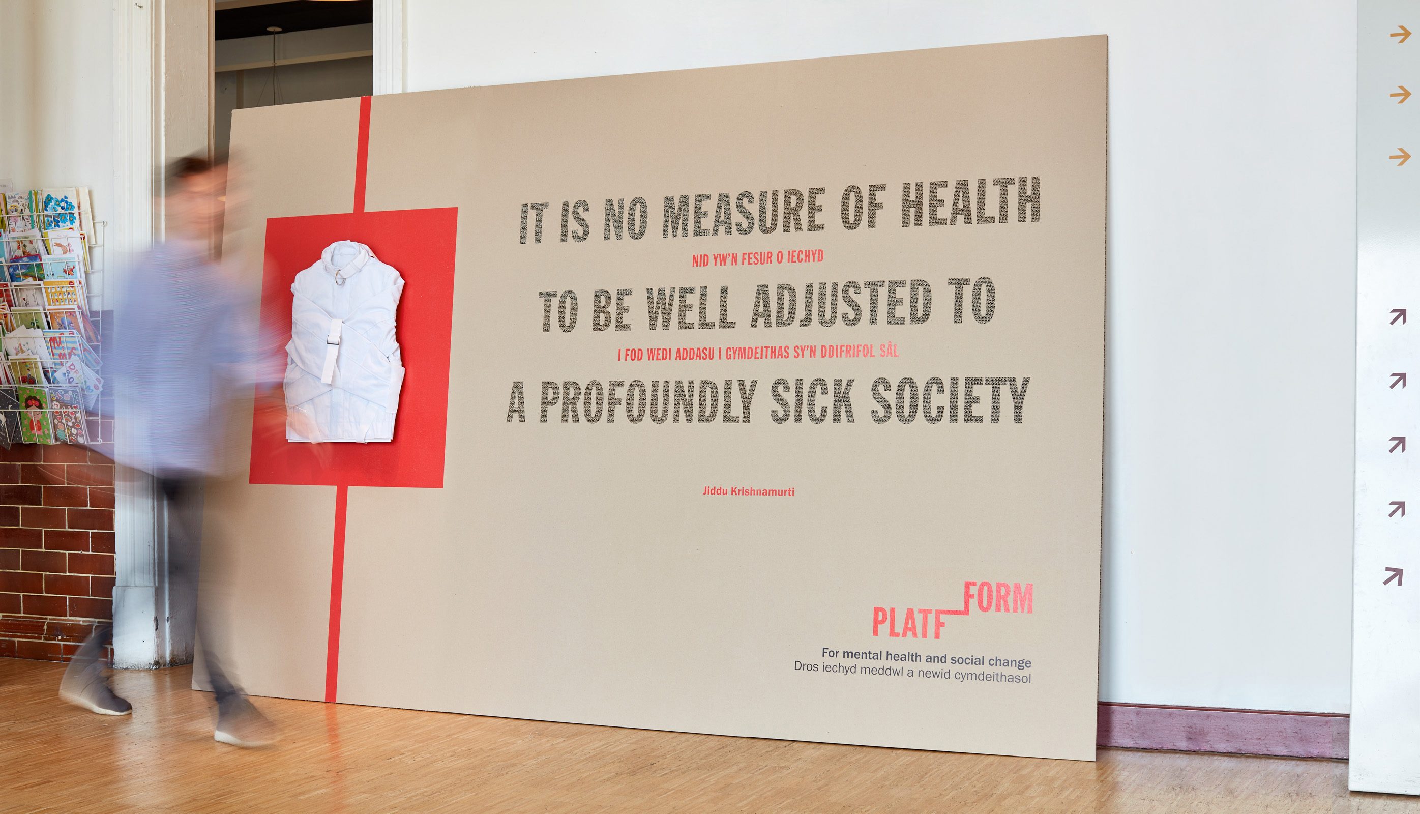 Photo of a branded event stand showing a hard-hitting message about mental health and social care