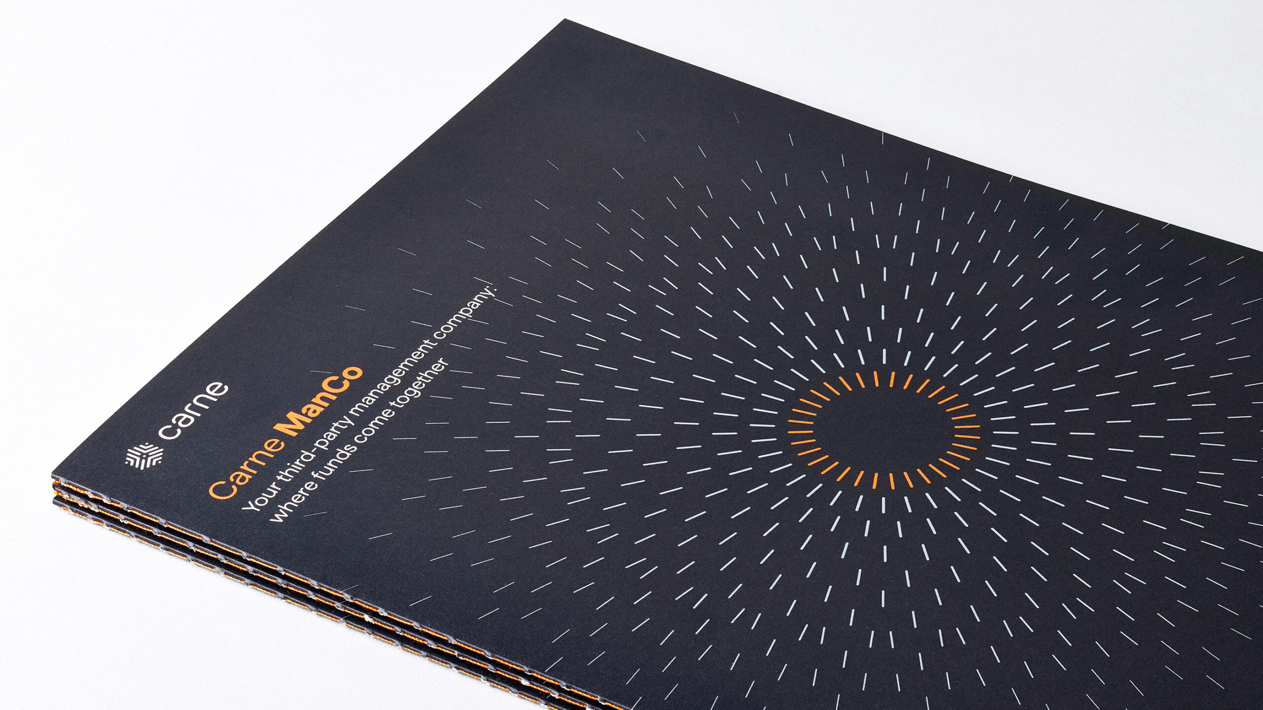 Close-up of branded Management Company brochures aimed at the asset management industry