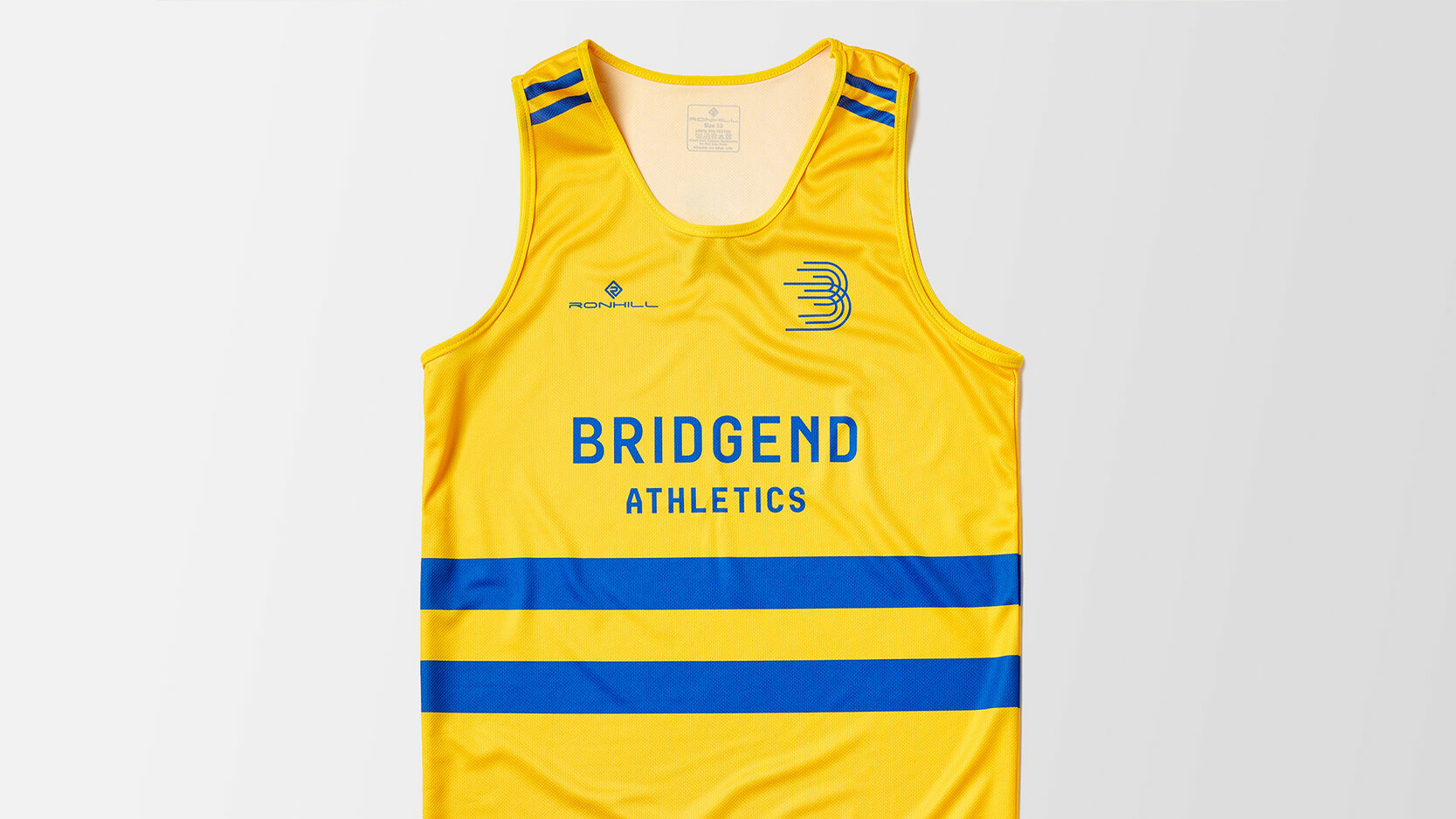 Yellow branded athletics club vest with two blue stripes against a grey background